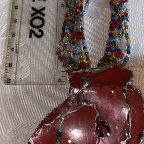 Handcrafted used multicolor Beaded Necklace w/lg. red metal hang dec. 8 strands - Picture 5 of 10